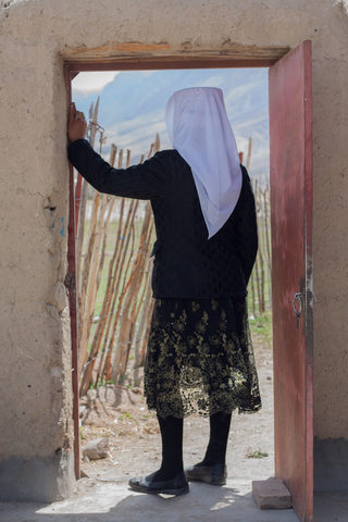 Pamiri Tajik Women standing at the Door